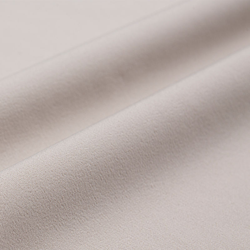 Tissu extensible dans quatre sens 190 g/m² 75D évacuant l'humidité.