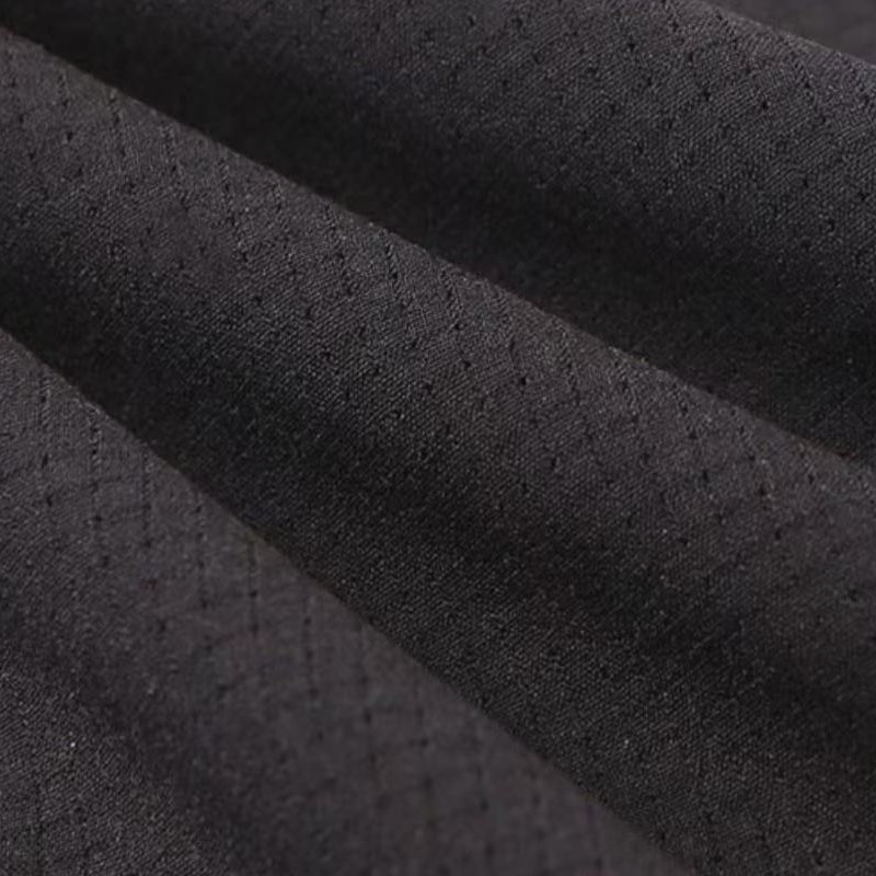 Tissu élastique en forme de grotte alcaline au toucher coton pour vêtements modernes et éco-conscients, 130 g/m²